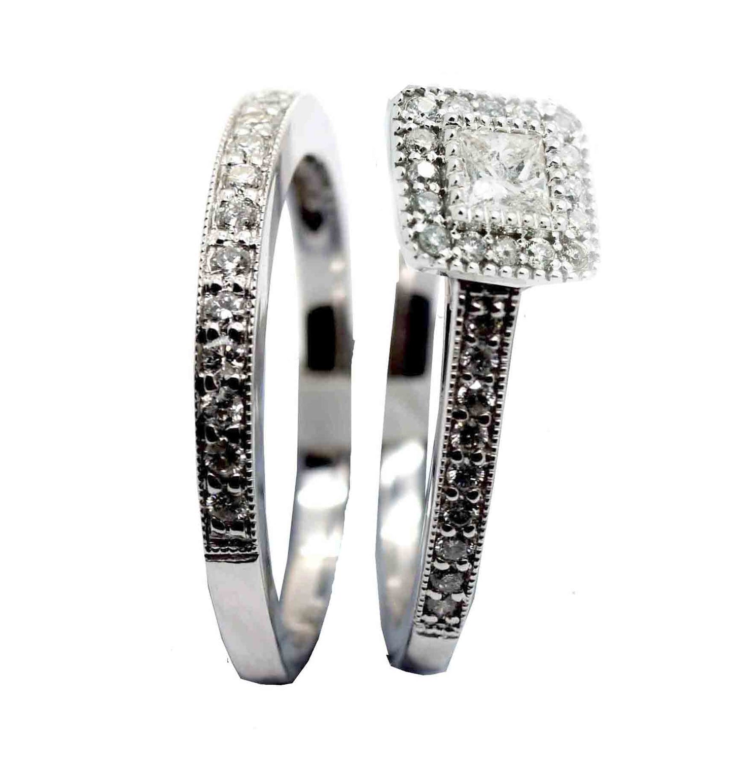 9k WG Diamond Engagement Ring Set...Engagement Ring 1PR=0.20ct & 30D=0.29ct..Wedding Band 17D=0.16ct..Total Diamond weight: 0.65ct Size Q