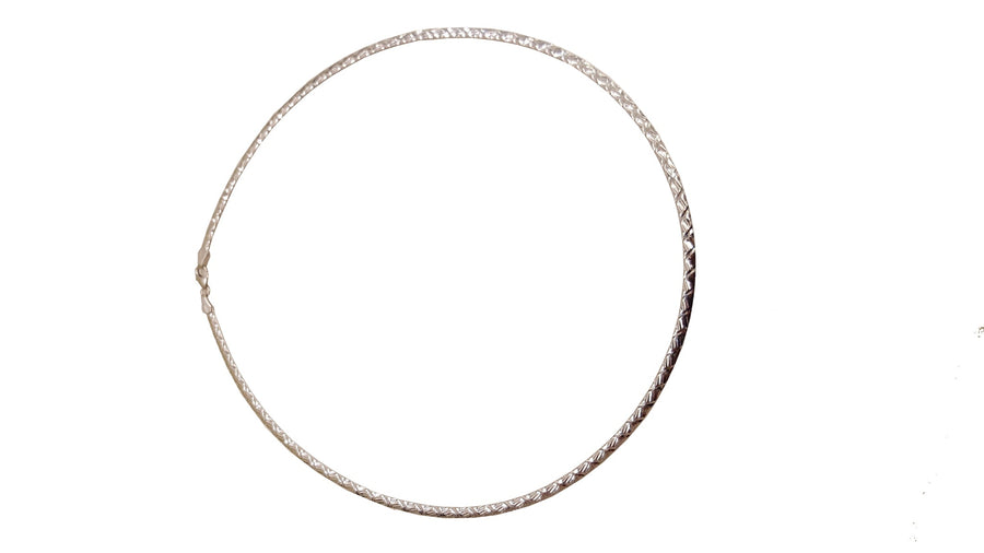 9k WG Italian Double Sided Plain and Swiss Cut  Omega Chain 3mm Wide 42cm Approx 8.9 g  This is an evening piece not suitable for everyday wear. To prevent damage, chain should be stored flat in a protective box.