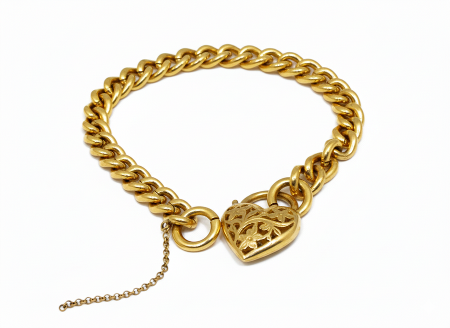 9k YG Solid Curb Bracelet 8.3mm wide 19cm . With safety chain & filigree padlock. Approx 41.93g