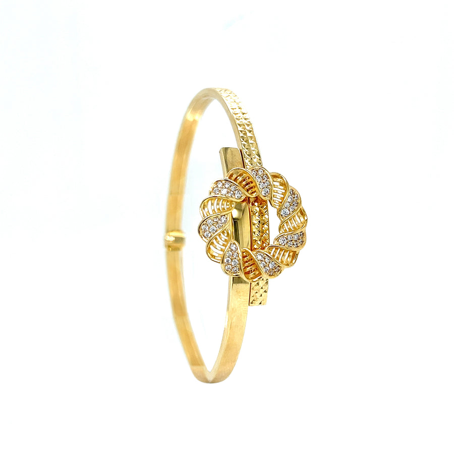 9k YG Twist Clasp Hinged Bangle with CZs 4mm. Inside Diameter 60x52mm