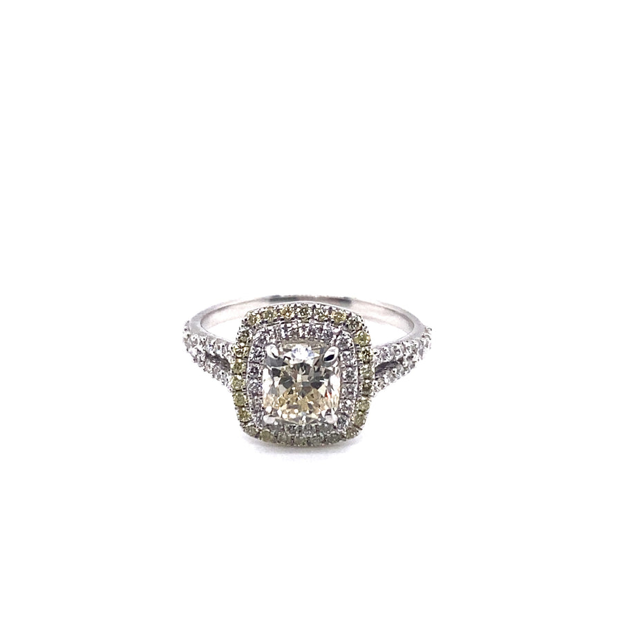 14k WG  Cushion Double Halo Diamond Ring. Centre Stone Cushion Cut = 1.20ct, K/VVS2 HRD Certified. Side White Diamonds 42pcs = 0.39ct VS-GH. Side Fancy Yellow Diamonds 26pcs = 0.16ct, VS-Natural Fancy Yellow. HRD Certified. Size N