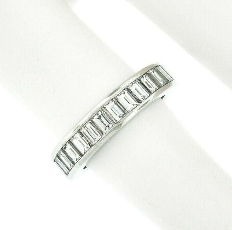 Platinum Band set with 10 Baguette Diamonds = 1.03ct. Size Q.