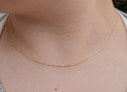 18k YG Diamond Cut Trace Chain 1mm wide 55cm. O-Ring at 50cm Approx. 2.6g