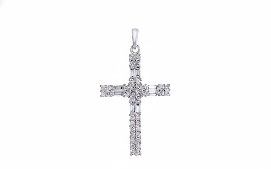 9k WG Diamond Cross Claw Set with 38D=0.27ct and 8 Baguette Diamonds Approx 0.15ct. TDW Approx 0.42ct. Meas. 23x17mm