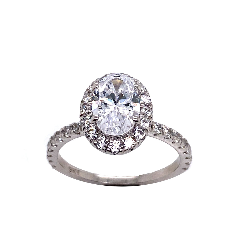 "Alannah" 9k WG 9 x 6mm (1.20ct)  CZ Oval Halo Ring with CZ Halo. CZ stones set on band. Size N