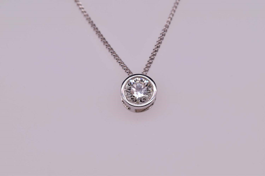 9k WG Diamond Pendant 1D-0.45ct with a GIA Cert Bezel Set . Meas. 6.3mm