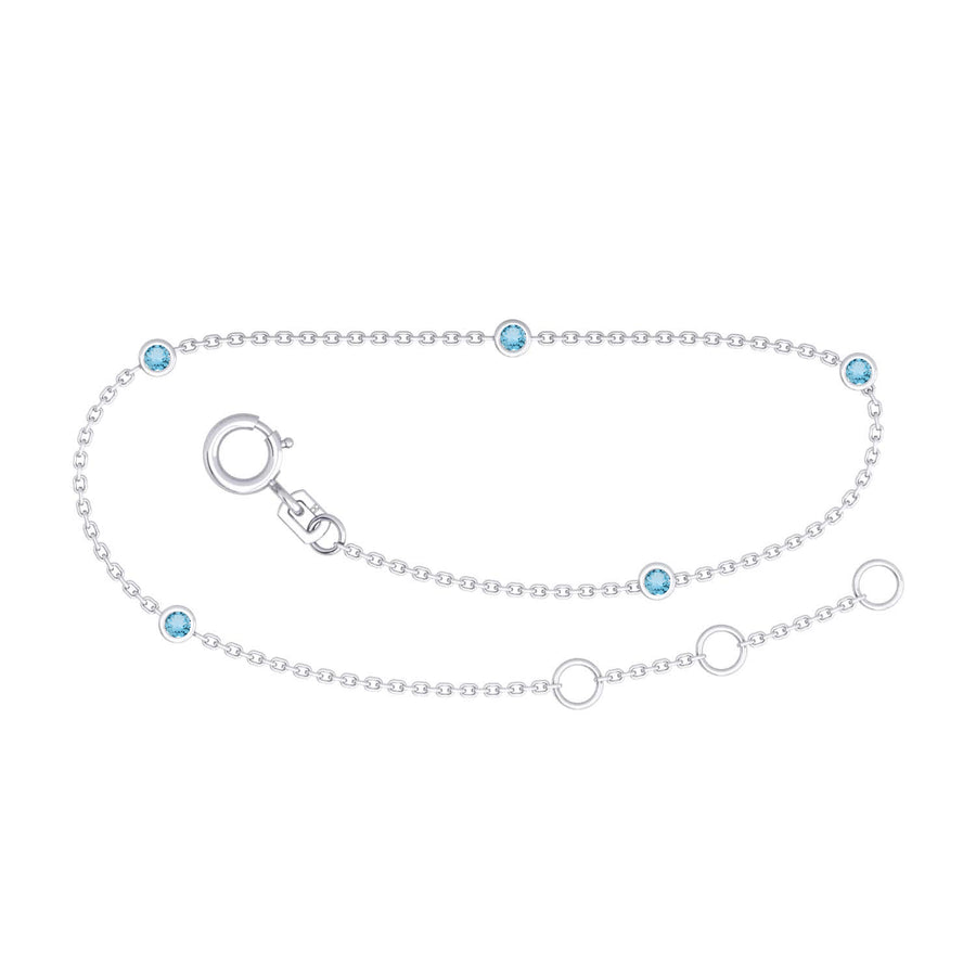 9k WG Solid Oval Link Blue Topaz Bracelet 1.4mm Wide 19.5cm . Bezel Set with 5TP = 0.25ct, O-Rings at 16.5 & 18cm.