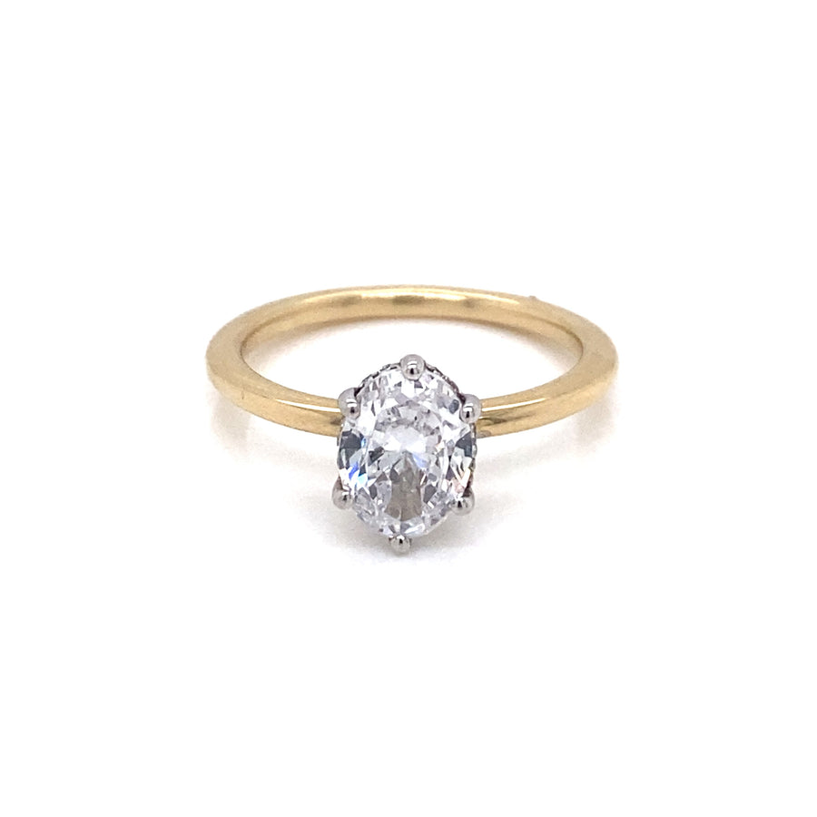"Stephanie-Maree" 9k Yellow Gold Solitare Band with 9k White Gold Setting and CZ's on under bezel of setting. Set with a CZ to suit an Oval Diamond = 1.00ct.