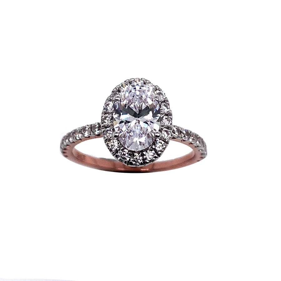 "Alannah" 9k RG 9 x 6mm (1.20ct)  CZ Oval Halo Ring with CZ Halo. CZ stones set on band. Size P