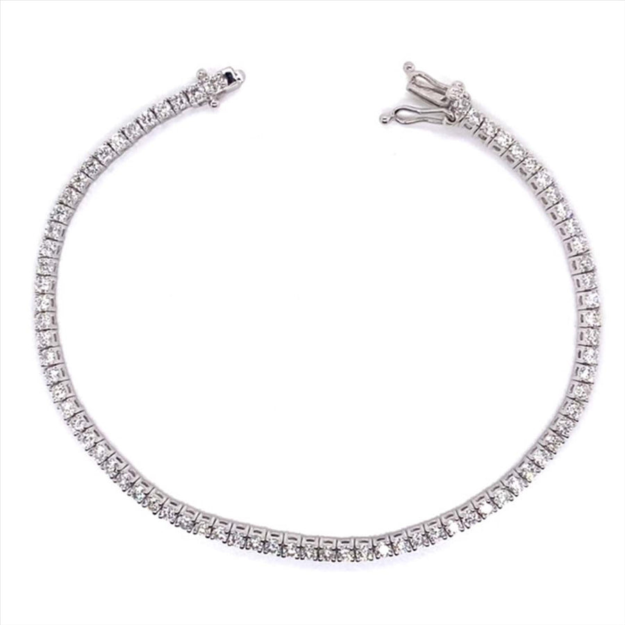 9k WG CZ Tennis Bracelet 2.6mm wide 18cm set with 71 CZs. 18cm