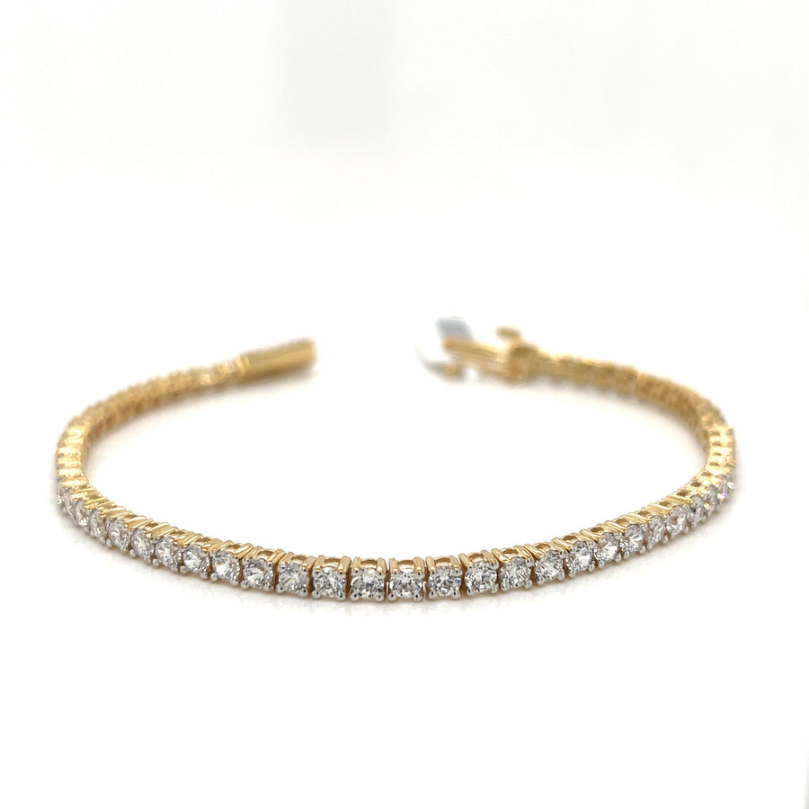 9k YG Solid CZ Tennis Bracelet 3.5mm wide 19cm set with 59 CZs.