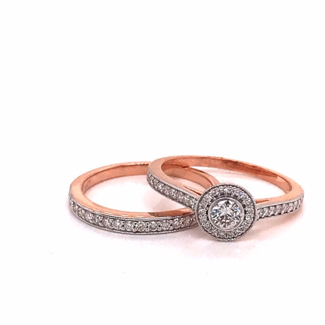 9k Rose Gold  Diamond Engagement Ring Set...Engagement Ring 1D=0.26ct & 36D=0.30ct..Wedding Band 17D=0.14ct..Total Diamond weight: 0.70ct..Size O1/2